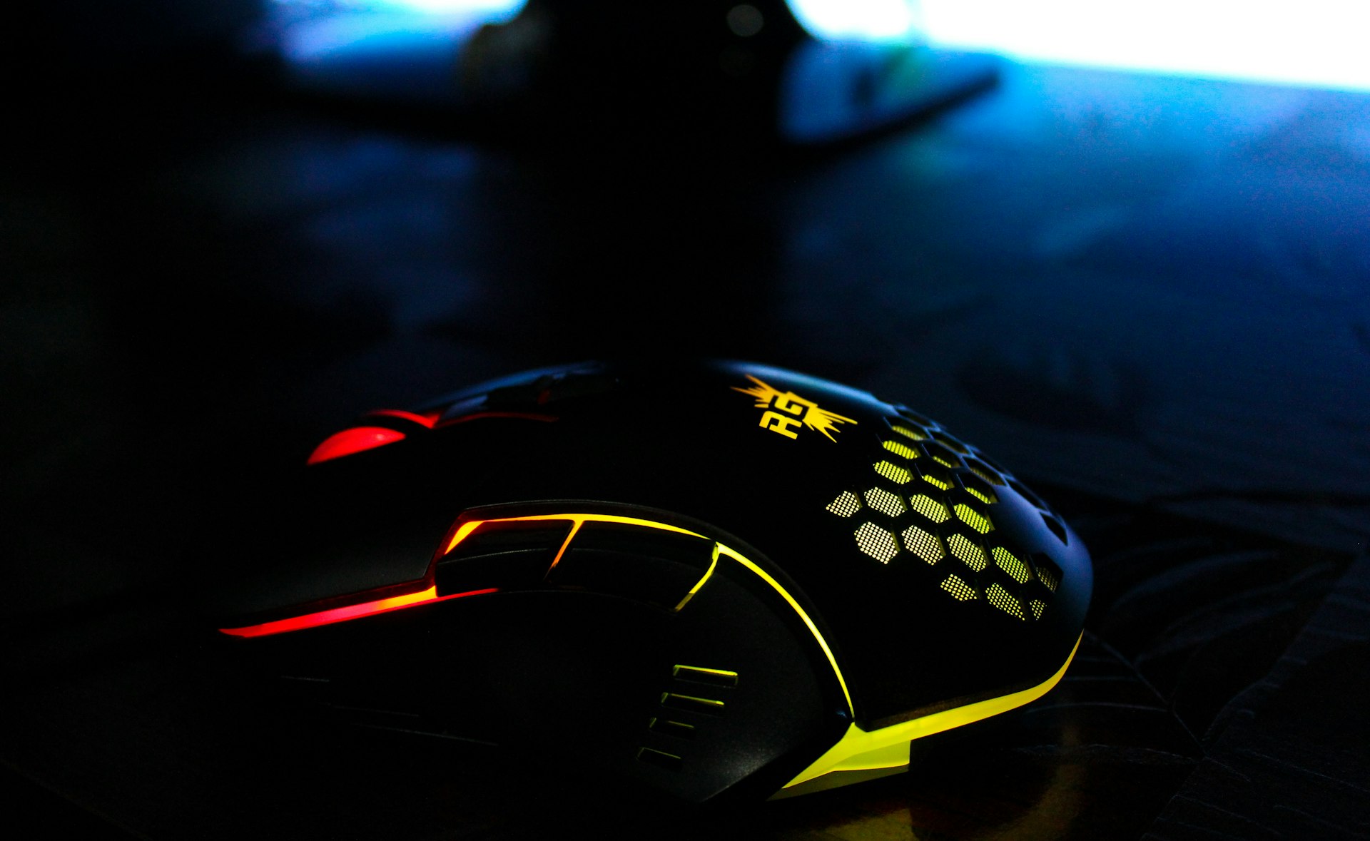 black and yellow gaming mouse
